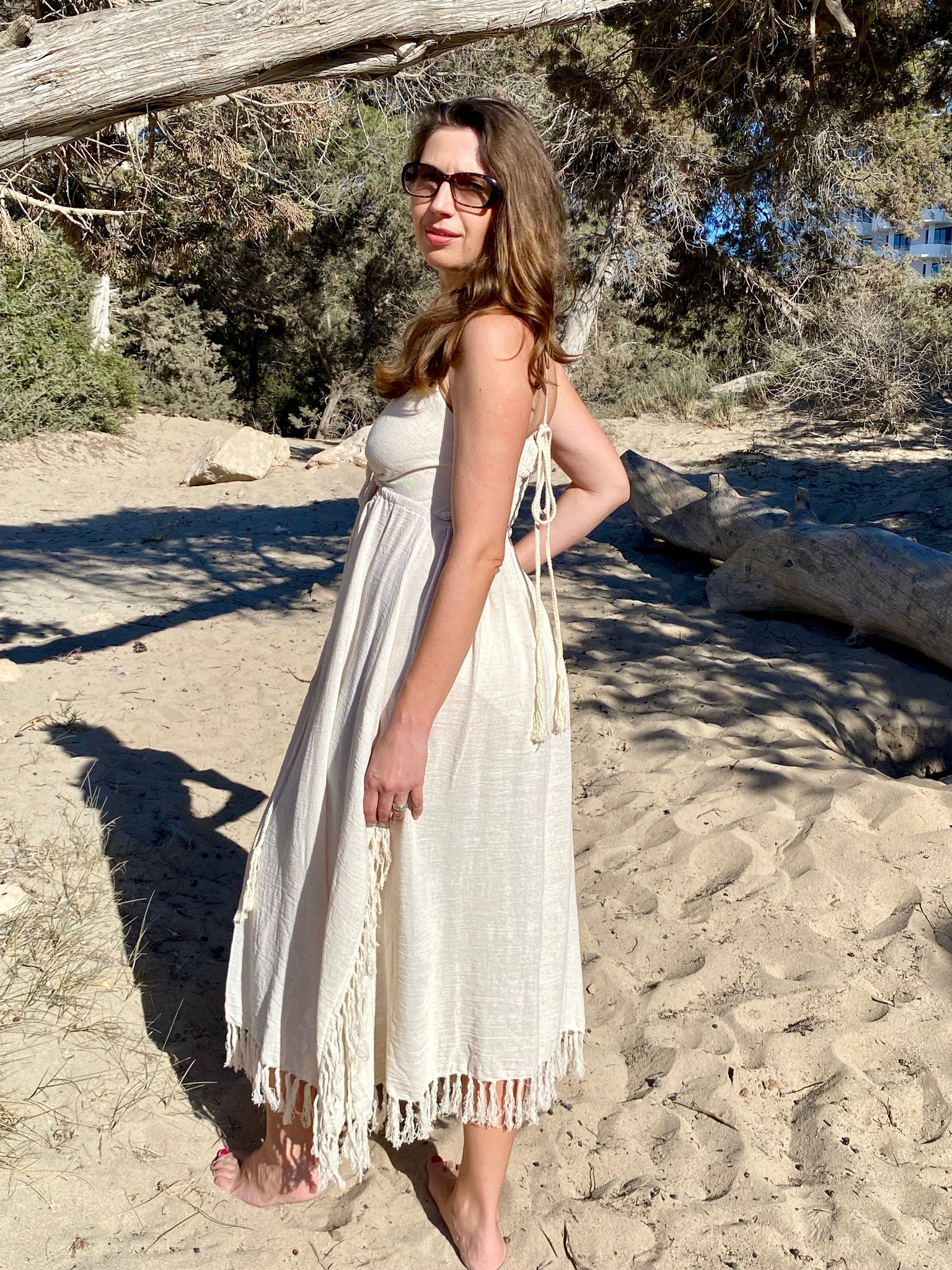 White boho long dress from raw organic cotton. White boho long dress from raw organic cotton.