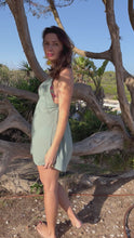 Load and play video in Gallery viewer, Sexy short beach dress with deep neckline from eco friendly fabric.
