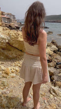 Load and play video in Gallery viewer, Mini skirt from hand woven raw organic cotton.
