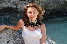 Load image into Gallery viewer, Black feathers with cowrie shells necklace/armband.
