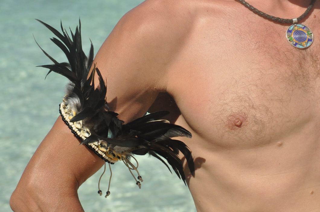 Black feathers with cowrie shells necklace/armband.