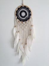 Load image into Gallery viewer, White and black dream catcher with feathers.
