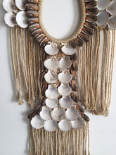 Load image into Gallery viewer, Big shell necklace wall decor.
