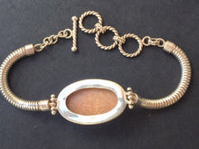 Load image into Gallery viewer, Silver snake chain  bracelet with fossil coral stone.
