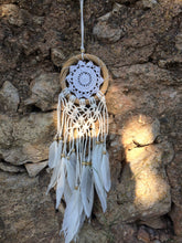 Load image into Gallery viewer, White dream catcher with feathers and wooden frame.
